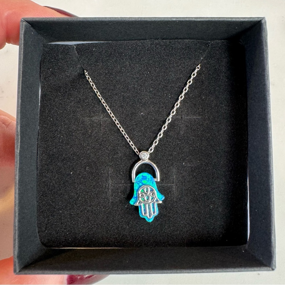 Hand that protects us amulet pendant in stirling silver,blue stone,diamond chip